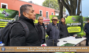 Artesanos de la Plaza Xicohténcatl acusan presiones para firmar comodato sobre carritos de venta.
